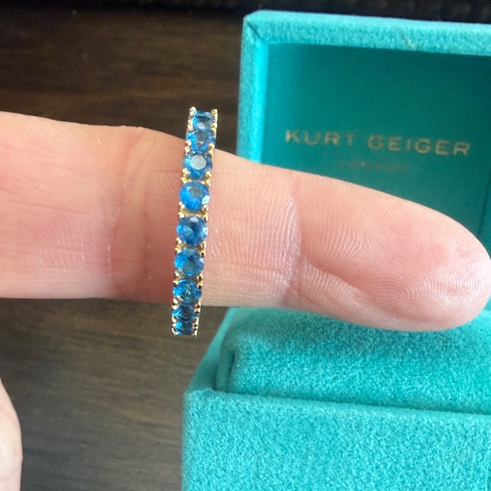 Kurt Geiger Gold Eternity Band with Blue Stones Size 9